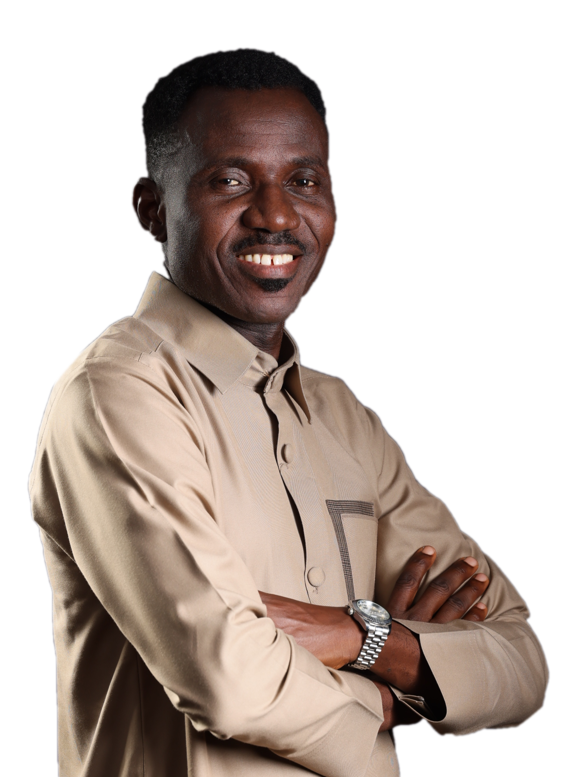 Kayode Braimoh smiling with his arms folded